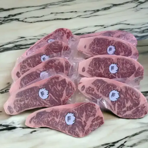Alternative view of Black Market Grain Fed Striploin MB5+